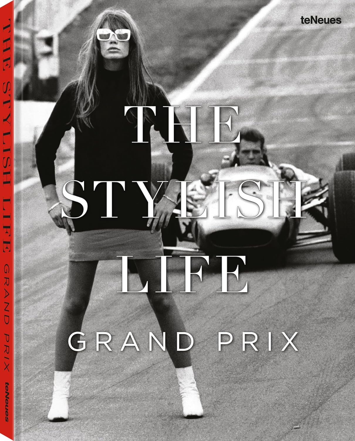 Book cover of 'The Stylish Life Grand Prix' with a black and white photo of a woman and a race car.